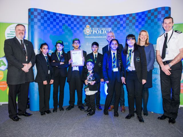 PCC Mark Burns-Williamson with Chief Constable John Robins and the winners of the 2019 West Yorkshire Police Schools Cyber Competition, Carlton Bolling College
